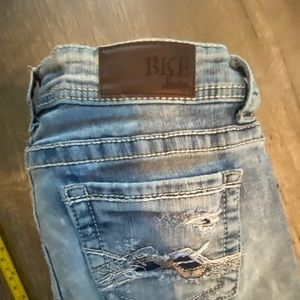 BKE Stella distressed “acid” wash bootcut